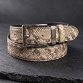 Natural Python Belt, rolled, on dark slate