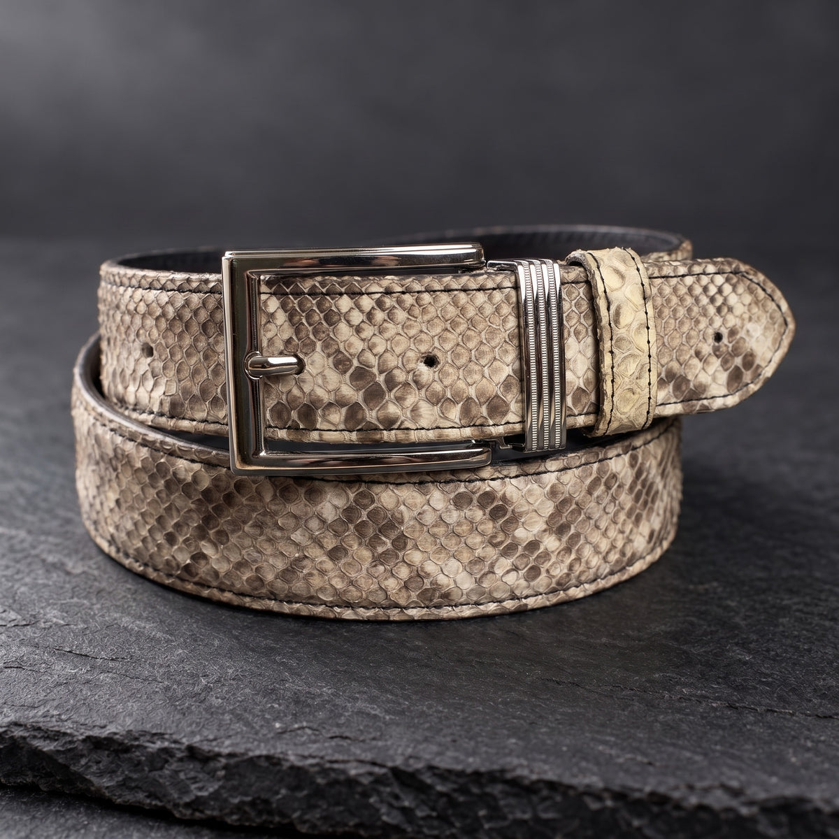 Natural Python Belt, rolled, on dark slate