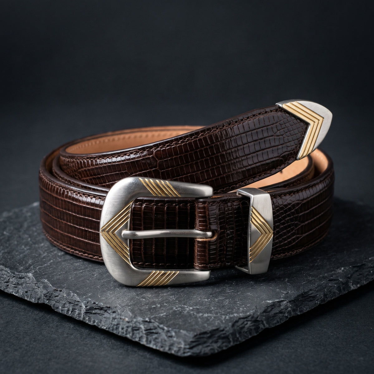 Brown Lizard Western Belt, rolled, on dark slate