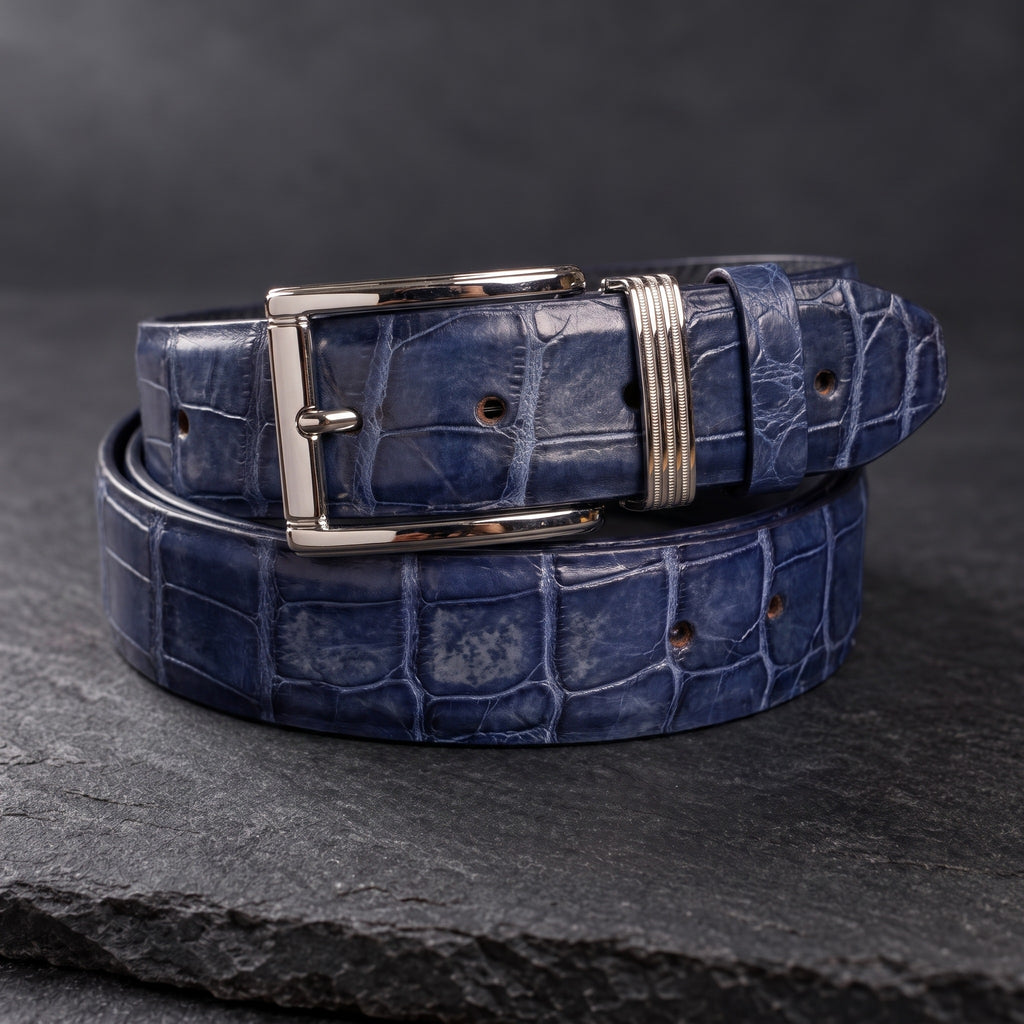 Navy Crocodile Belly Belt, rolled, on dark slate