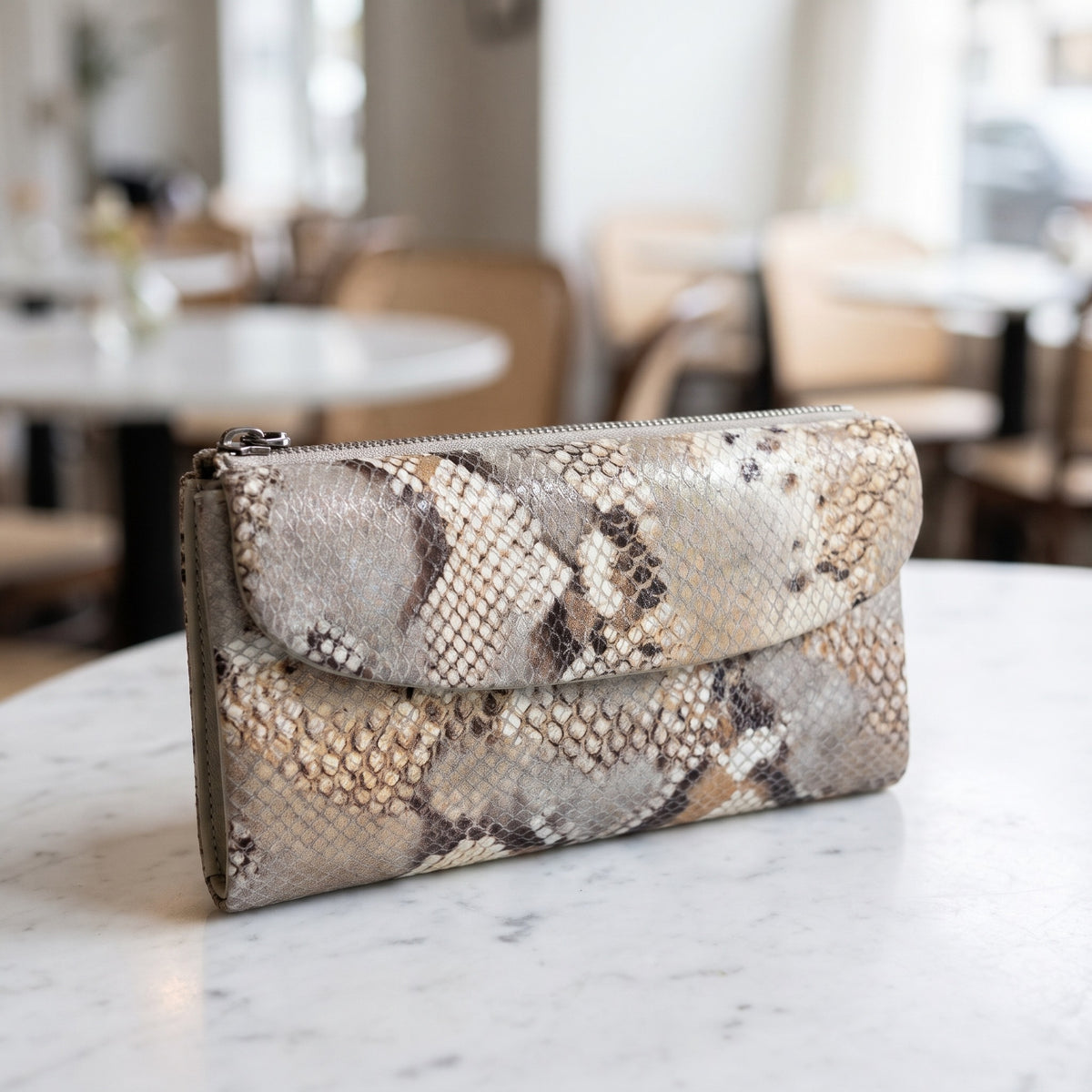 Snake-Embossed Clutch in Beige [Beige]