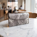 Snake-Embossed Clutch in Grey [Grey]