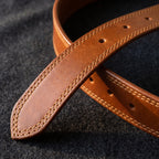 Close-up of the Italian One-Piece in Cognac: full-grain leather and double-stitched edges [Cognac]