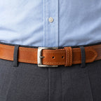 The Italian One-Piece in Cognac, worn with a light-blue oxford shirt and charcoal dress trousers [Cognac]