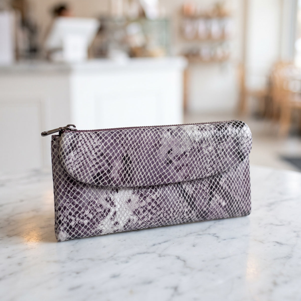 Snake-Embossed Clutch in Lilac [Lilac]
