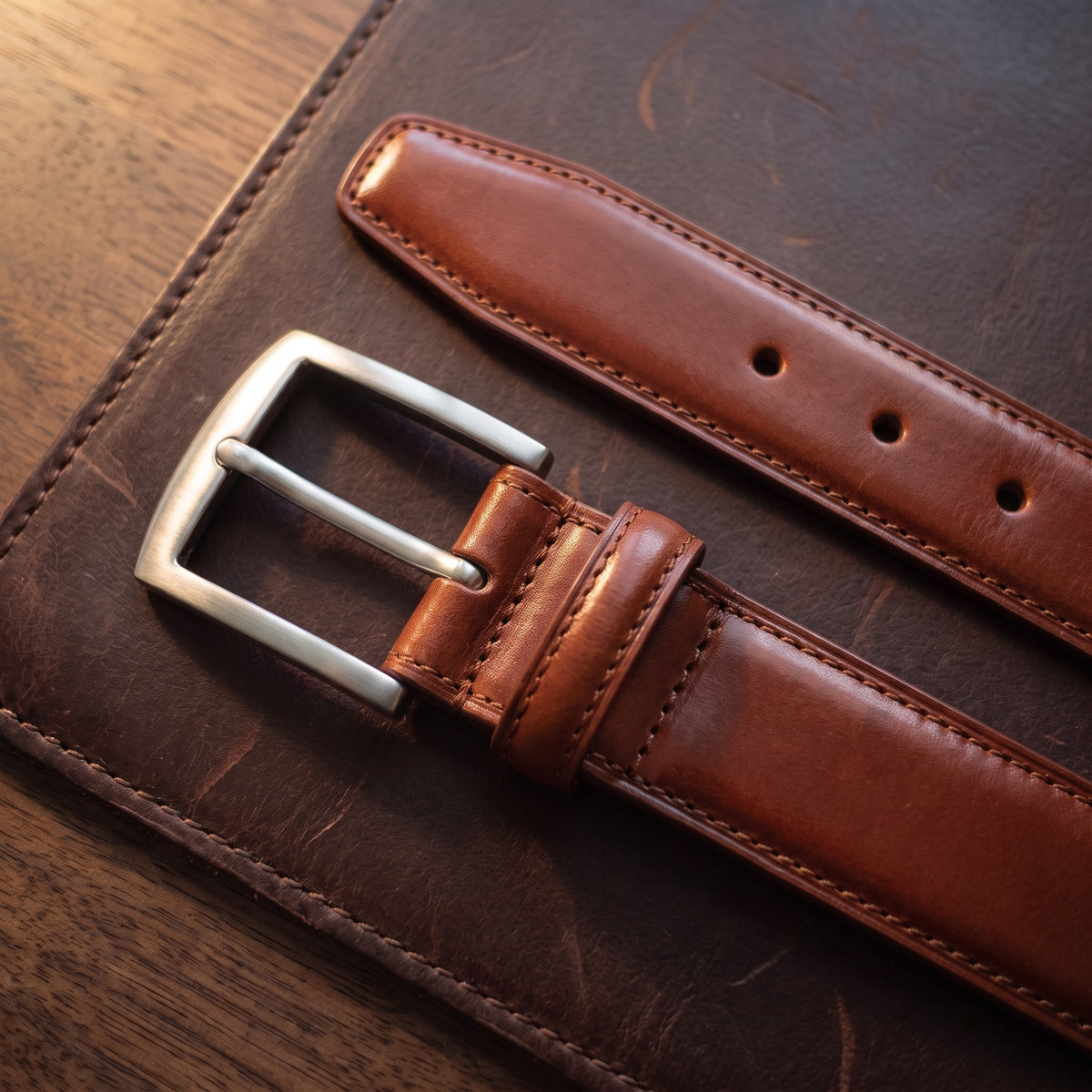 The Italian Dress Belt in Cognac, close-up of the buckle end [Cognac]