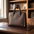 Slim Laptop Briefcase in Dark Brown, on a walnut executive desk [Dark Brown]