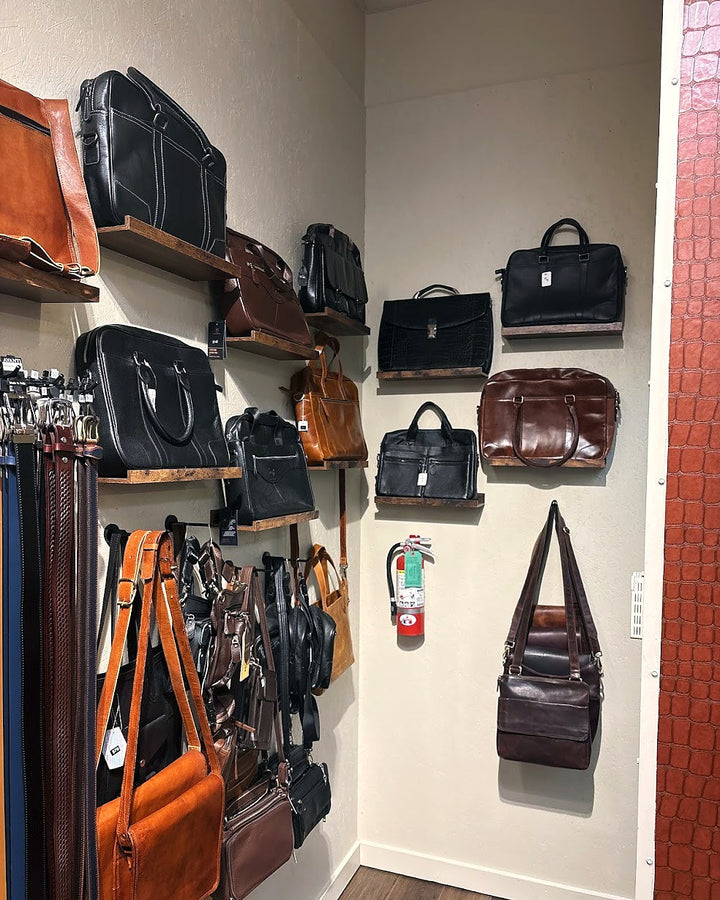 Leather briefcases and satchels on the wall