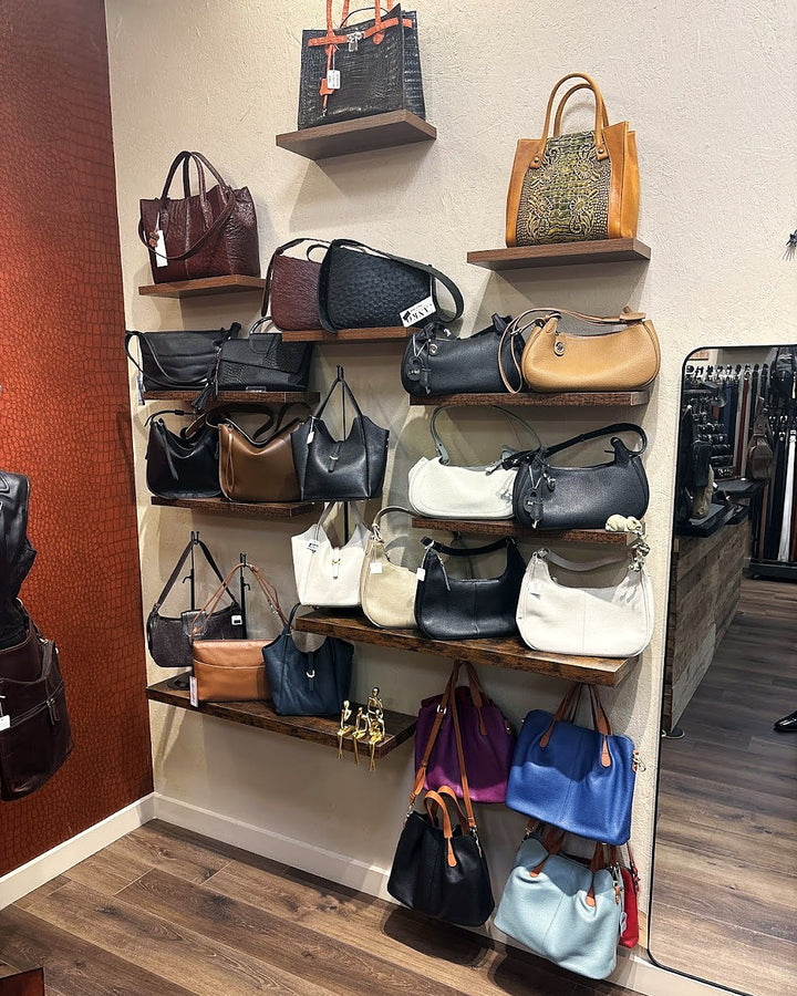 Leather handbags on the wall