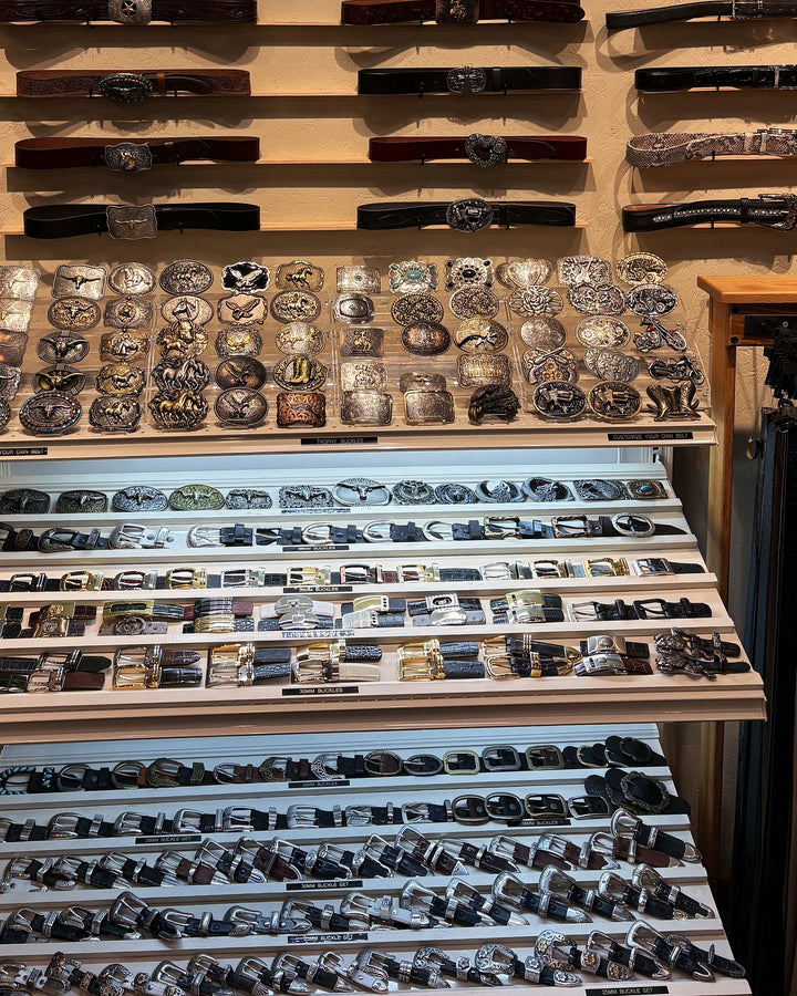 The lit buckle case under the belt wall